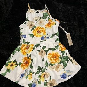 Floral romper made by Iris Basic.
